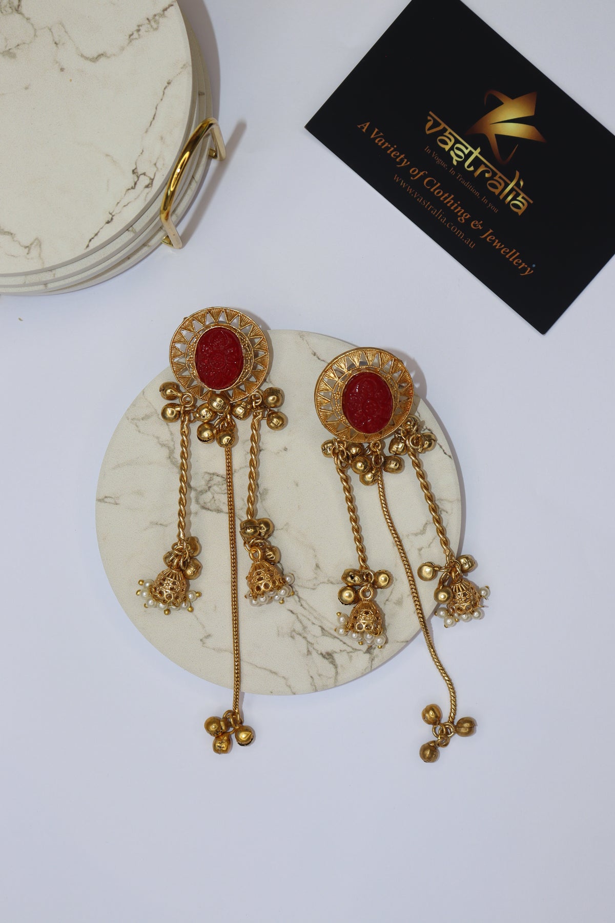 Carved Stone Sunburst Twin Jhumka Chain Earrings