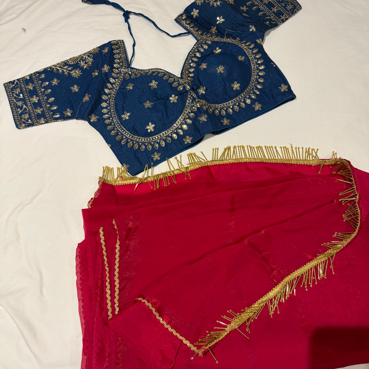 Crimson Pink Shimmer Tissue Organza Saree with Heavy Embroidered Teal Blue Blouse Set