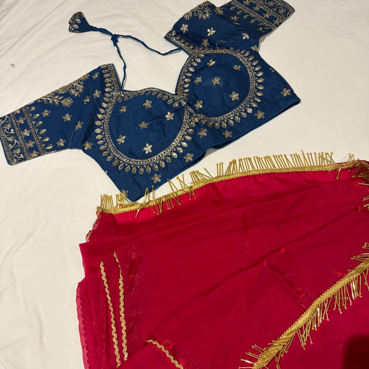 Crimson Pink Shimmer Tissue Organza Saree with Heavy Embroidered Teal Blue Blouse Set